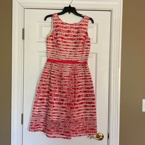 Taylor hot pink and white party dress.